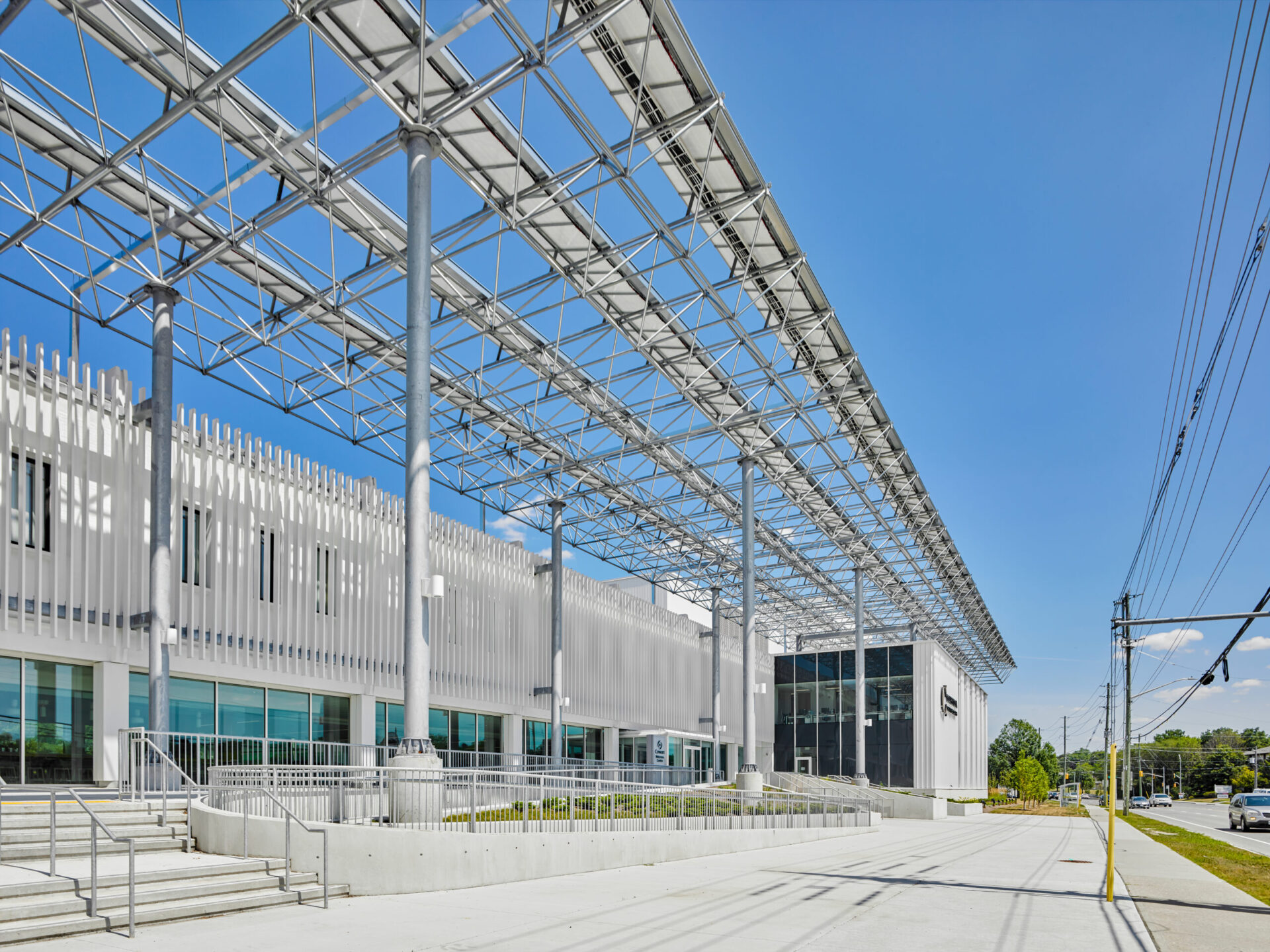 An architectural marvel with a metal roof and stairs.