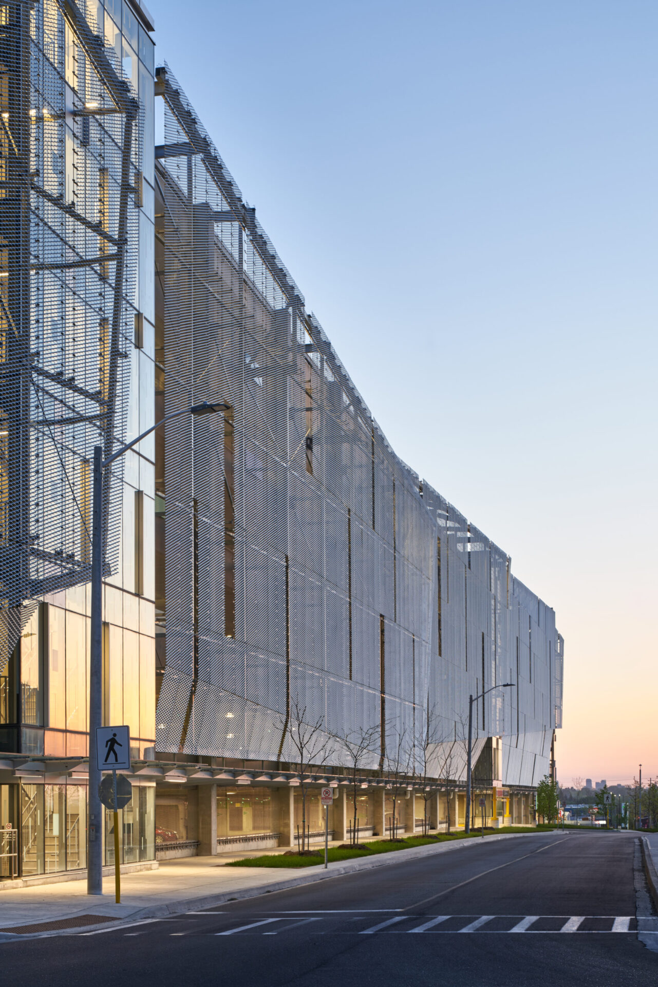 A majestic glass engineering marvel at dusk.