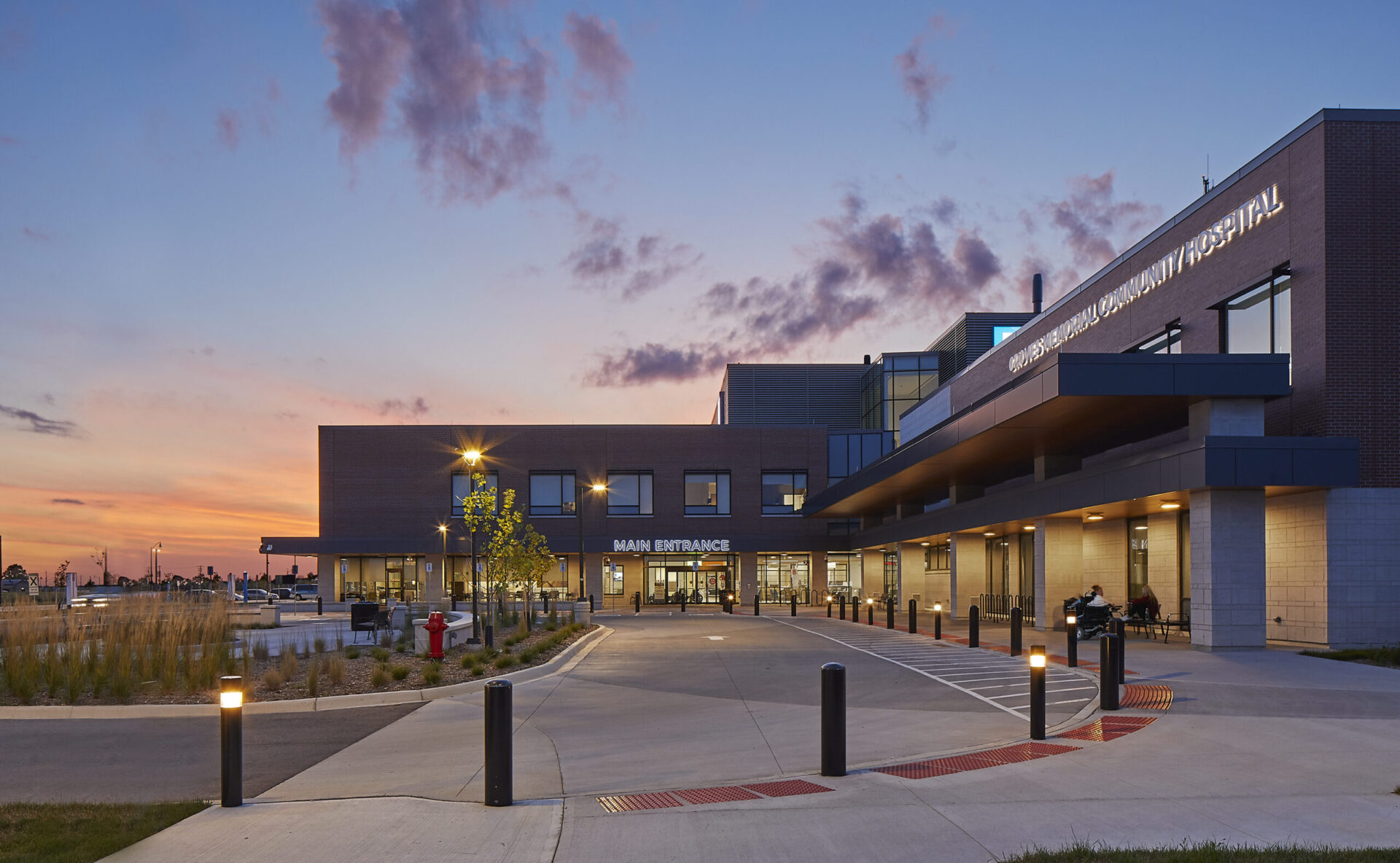The architecture of a hospital building at dusk.
