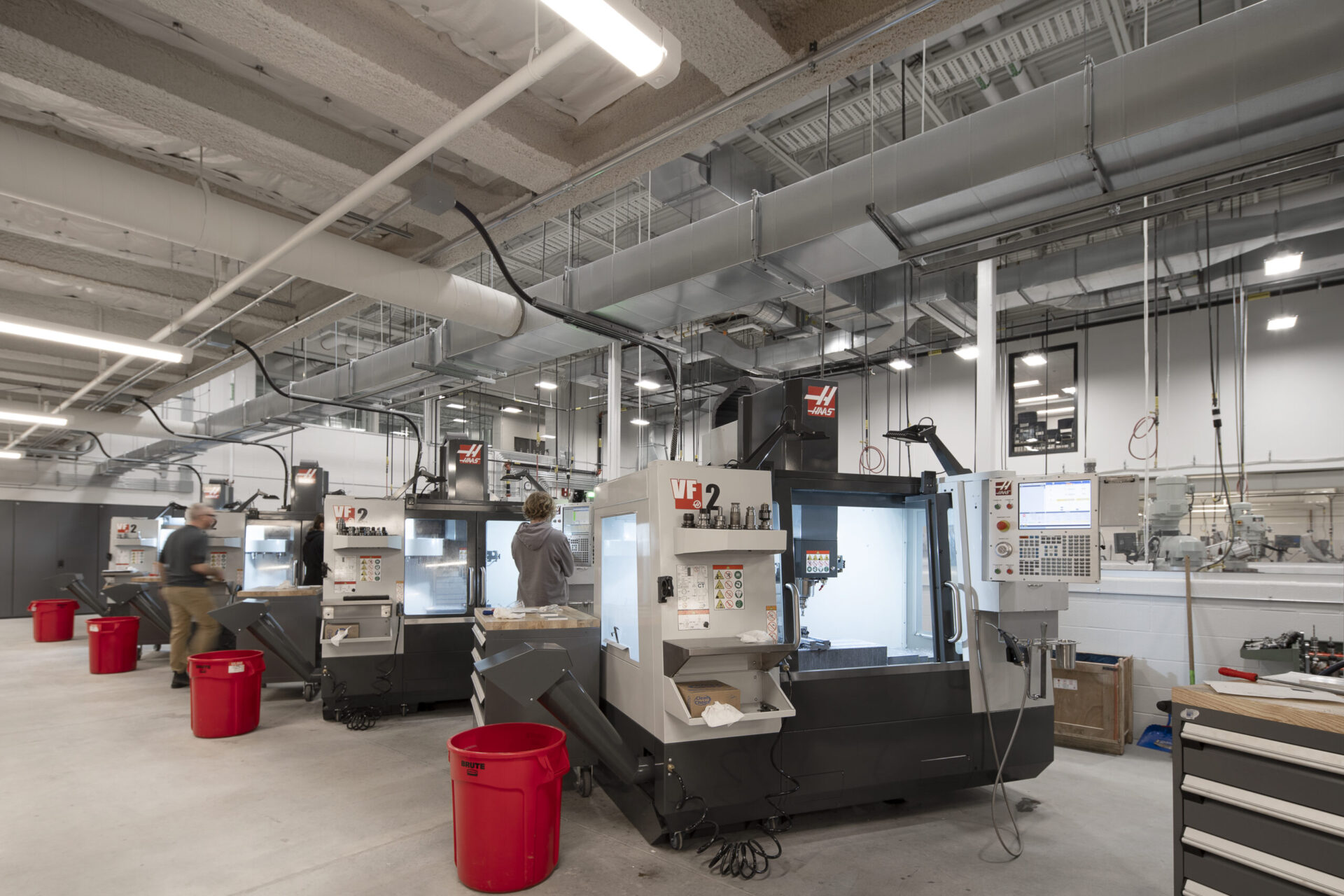 An engineering room with several machines in a building.