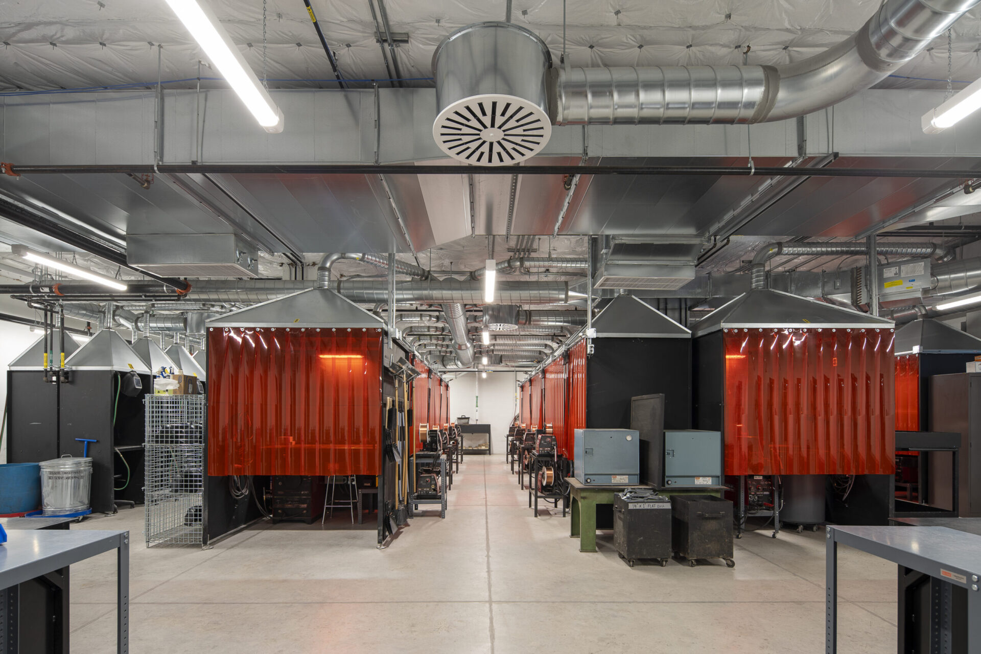 The interior of a lab building with a lot of equipment.