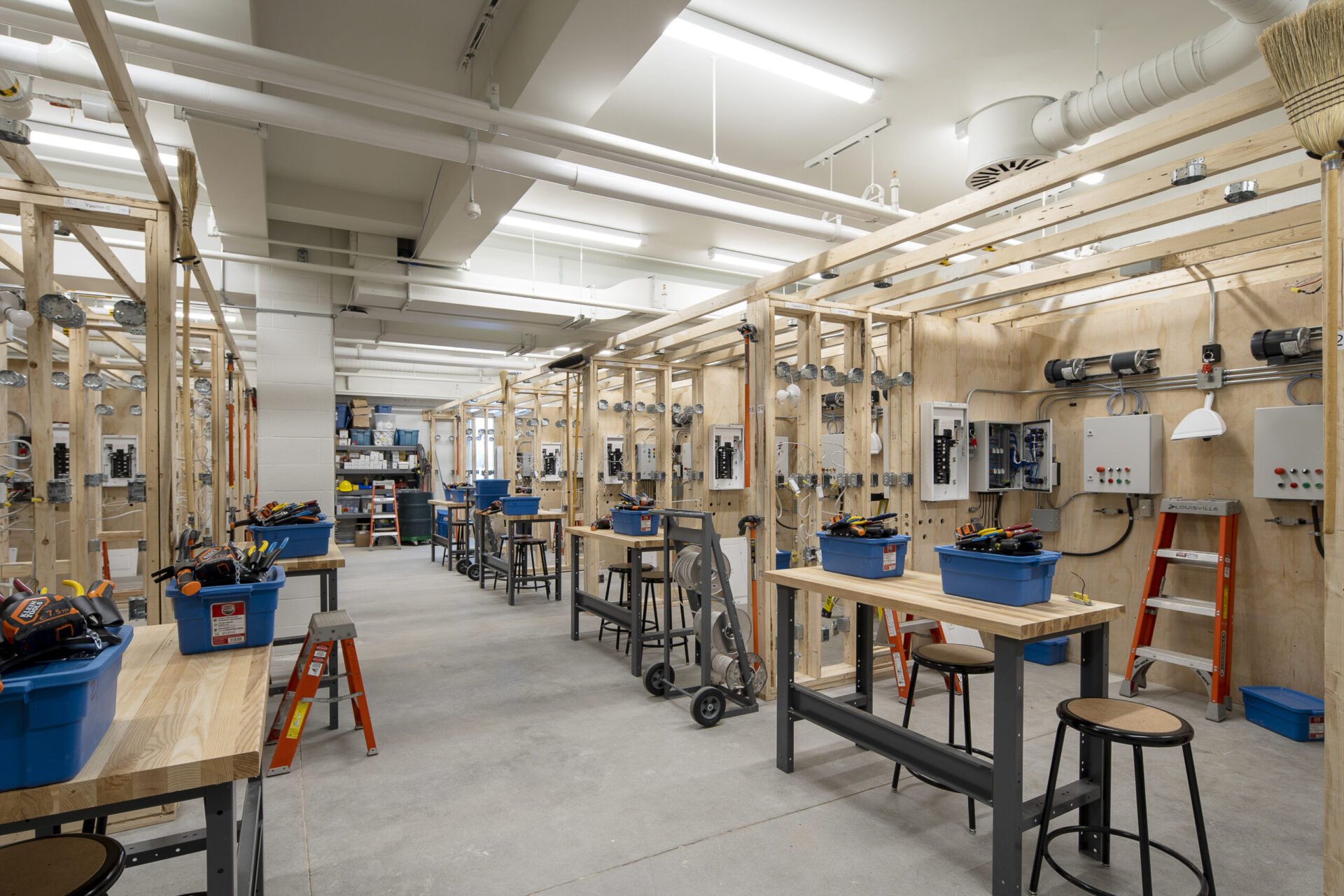 A room with a lot of engineering tools and equipment.