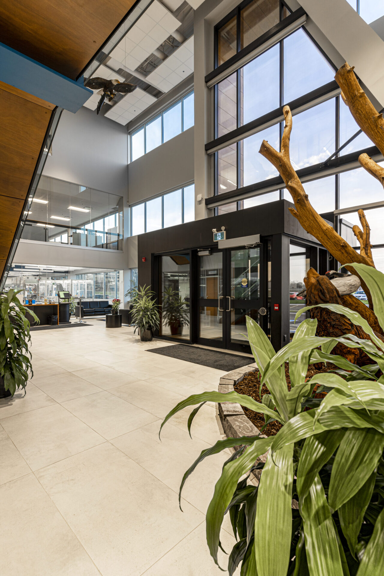 The lobby of a modern office building showcasing impressive architecture.