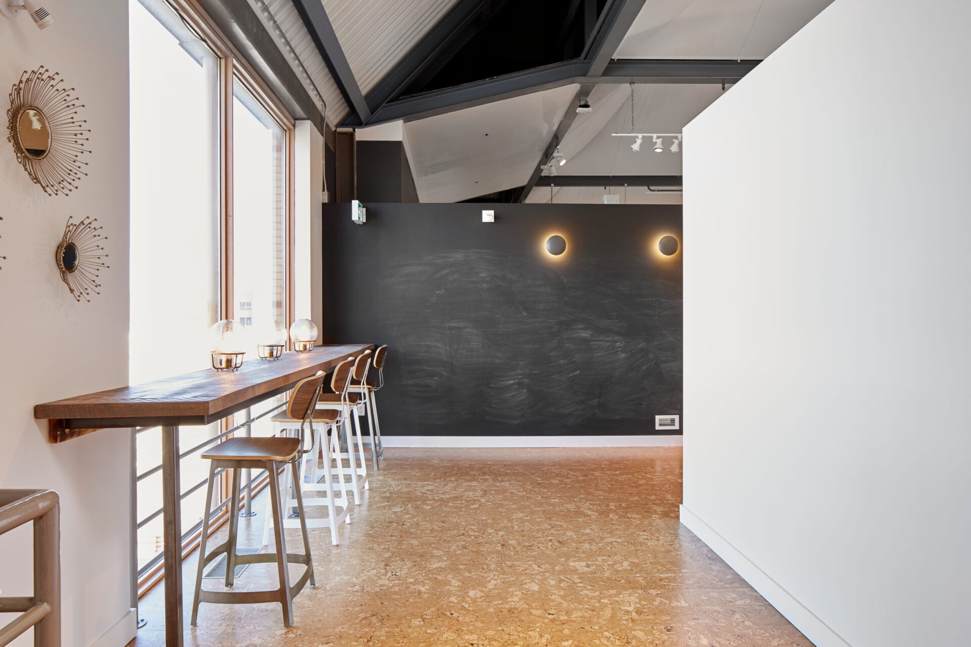 A room with a chalkboard wall for architecture or engineering purposes.