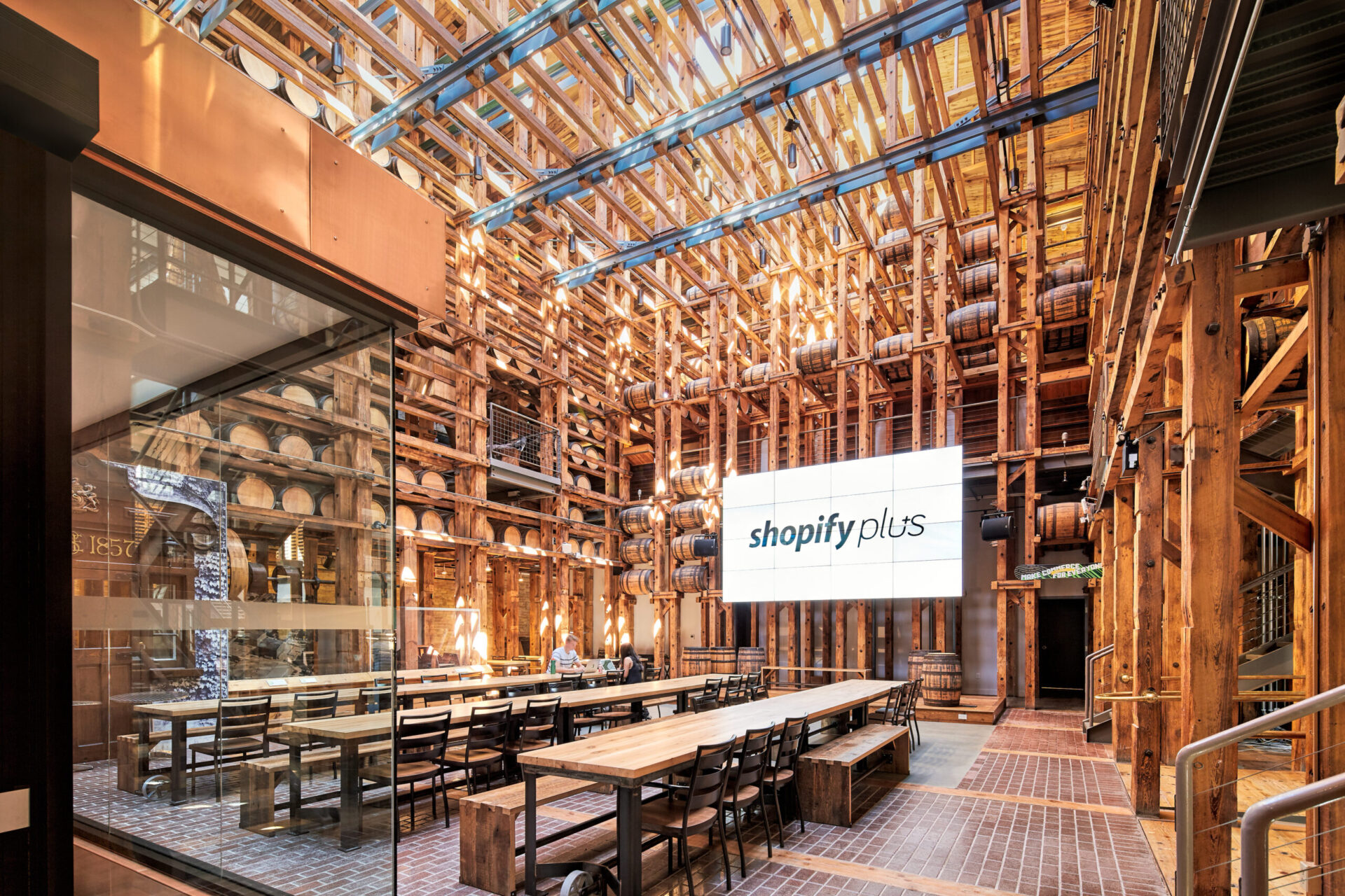 The architecture of a wooden building with tables and chairs.