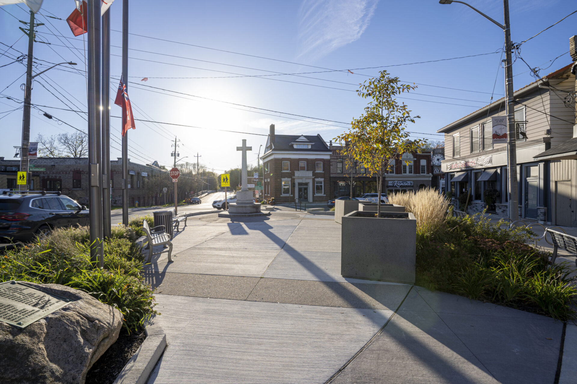 The architecture of the city street is highlighted by the shining sun.