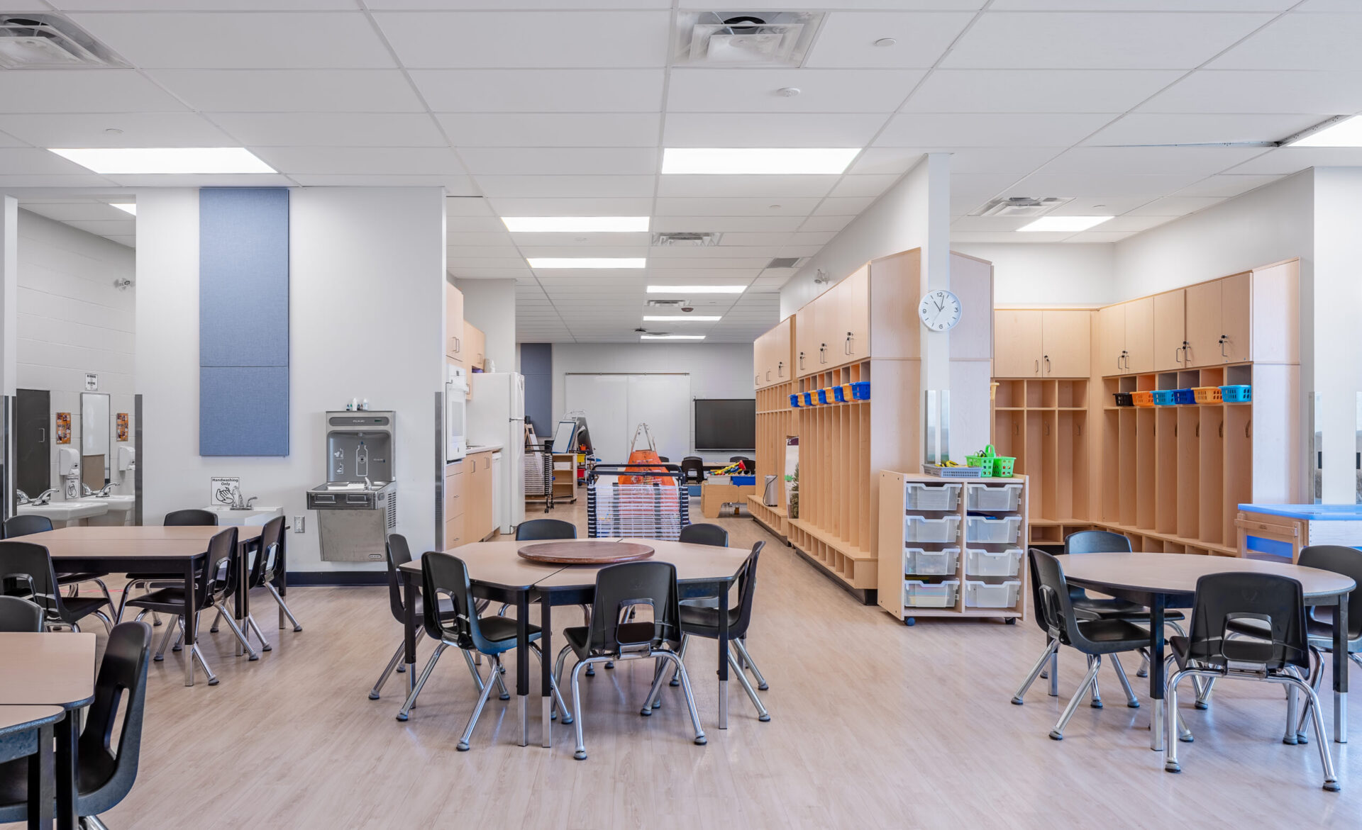 A classroom with tables and chairs designed for effective learning.