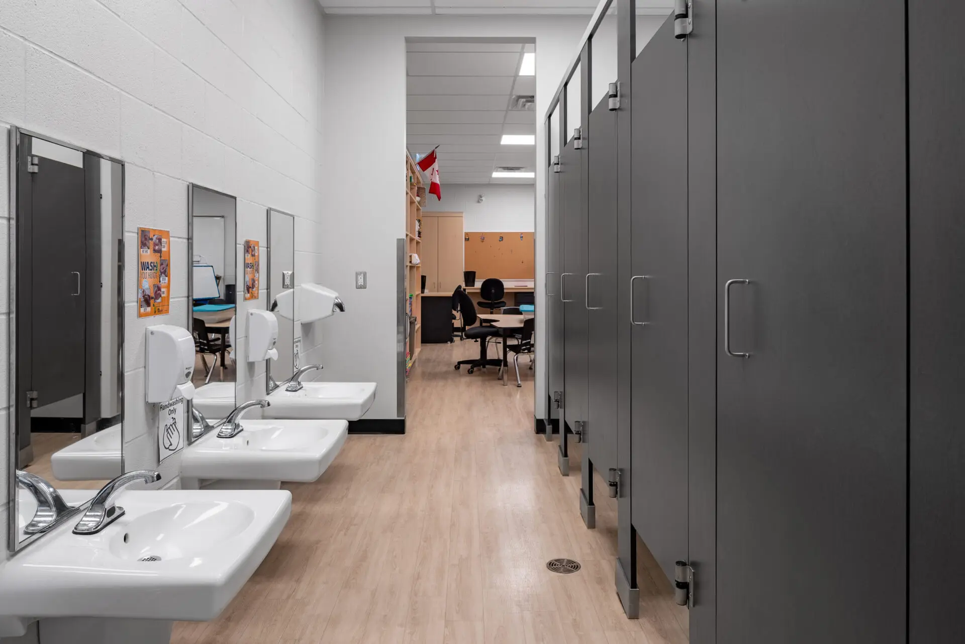 An architecturally designed bathroom with sinks and toilets.