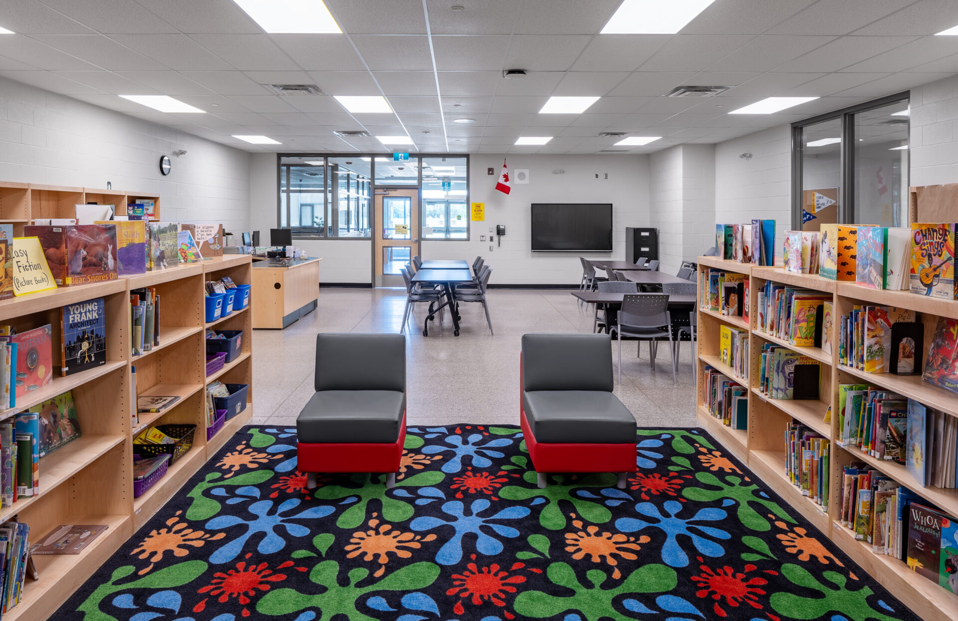 A library with colorful chairs.