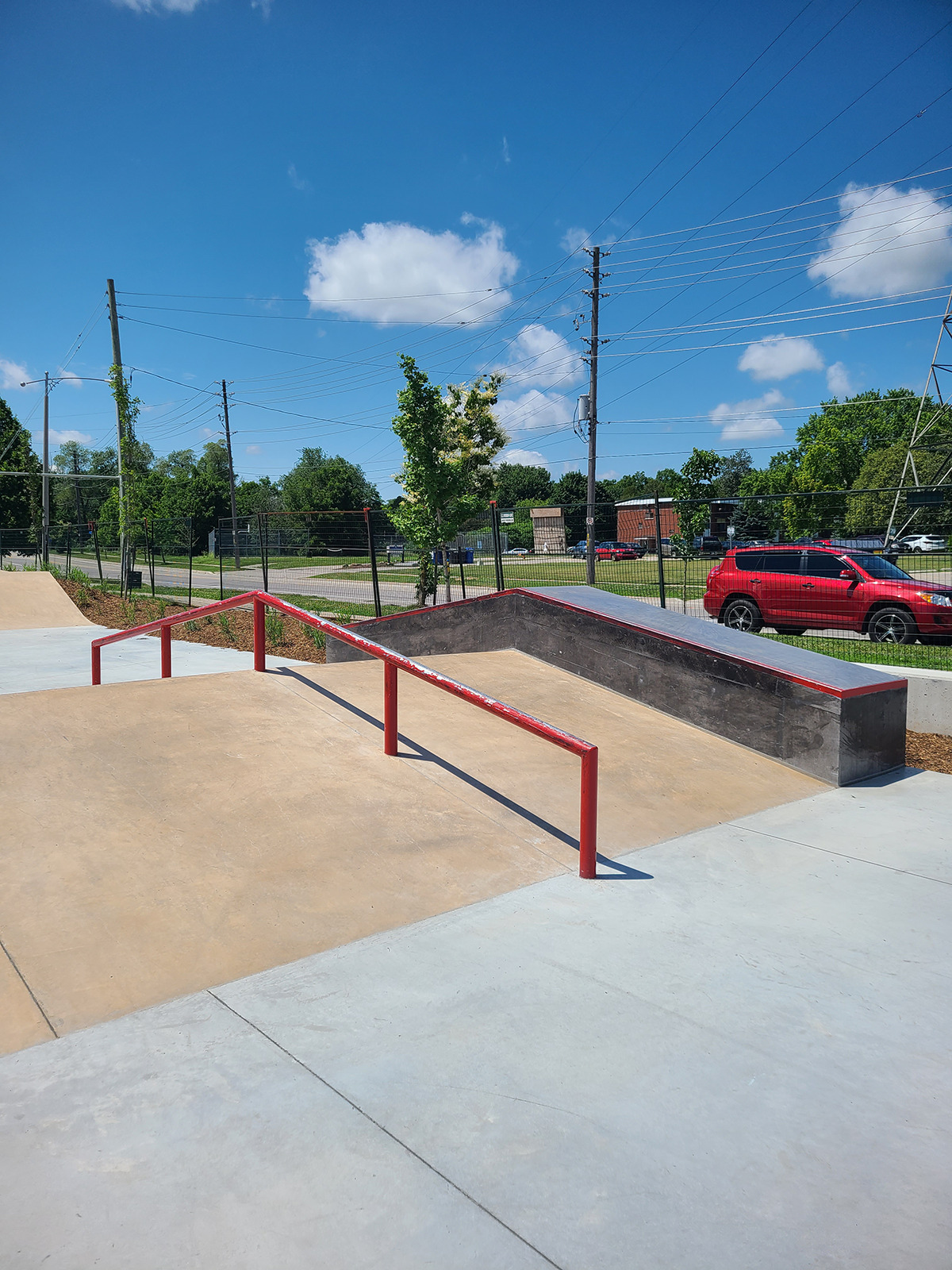 Albert McCormick Community Centre - Site Development: A skateboard ramp with red rails is being added to the centre's recreational facilities.